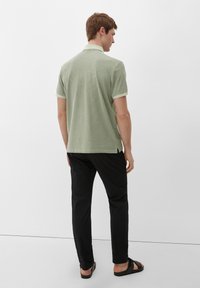 s.Oliver MIT ALLOVER - Poloshirt - olivgrün