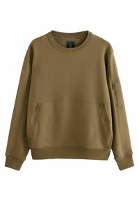 Sudadera color caqui con cuello de canalé, bolsillos laterales con cremallera y tejido texturizado. Cuenta con un corte relajado y mangas con puños.