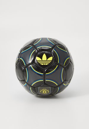 Black soccer ball with blue and yellow curved stripes, yellow Adidas logo, and Manchester United crest on a white background.