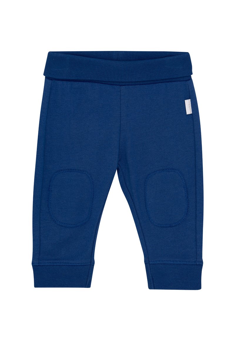 Blaue Kleinkind-Hosen mit geripptem Bund, Knieflicken und Bündchen, ausgestattet mit einem kleinen Seitenetikett am rechten Bein.