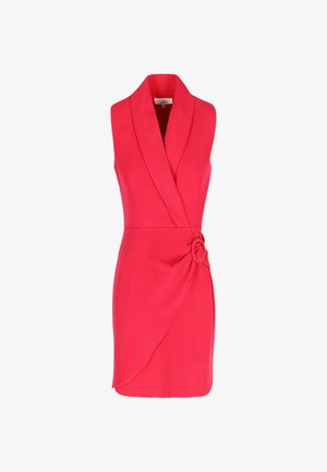 Pink sleeveless dress with a shawl collar, wrap design, side knot detail, and smooth texture. Simple, elegant silhouette.