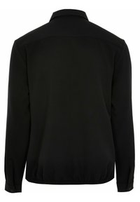 Černá dlouhá bunda s elastickým lemem, knoflíkovými manžetami a klasickým límcem, zobrazená zezadu na bílém pozadí.