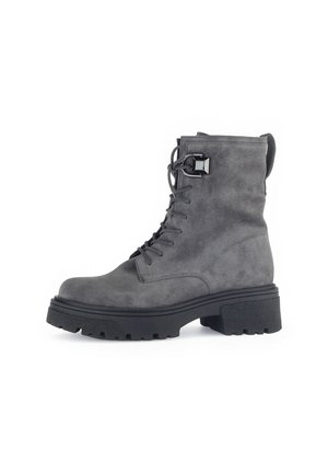 Gray suede combat boot with black rubber sole, lace-up front, and buckle accent. Features round toe and textured surface. Lightweight design.