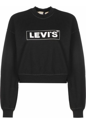 Sweat-shirt noir court à manches longues, avec un logo rectangulaire blanc imprimé sur le devant et des détails de couture visibles.