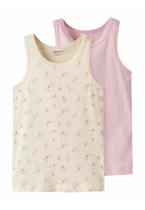 Two tank tops: one cream with small pink floral print, the other solid light pink. Both feature sleeveless design and soft cotton material.