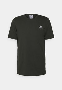 Zwarte katoenen t-shirt met een ronde hals en korte mouwen. Bevat een klein wit Adidas-logo op de linkerborst.