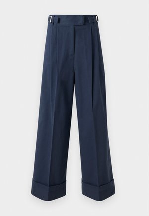 Navyblauwe wijde broek van een gladde stof, met een hoge tailleband en zilveren accenten, en omgeslagen pijpen.