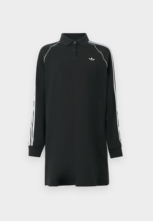 Črna polo majica z dolgimi rokavi in ovratnikom na gumbe, z belimi poudarjenimi črtami na rokavih in majhnim logotipom na prsih.