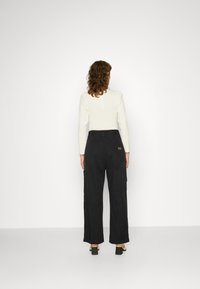 Replay PANTS - Calças cargo - black