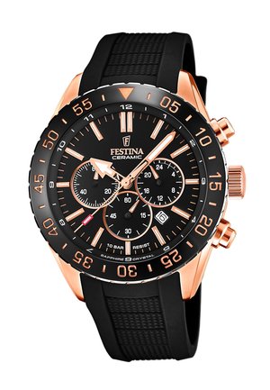 Montre en céramique noire avec accents en or rose, bracelet en caoutchouc texturé, grand cadran, sous-cadrans chronographes et verre saphir. Étanche jusqu'à 10 bars.
