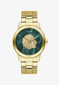 Sélectionné, gold-coloured tone