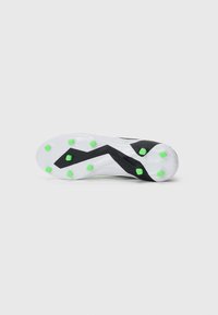 Cleats with a white base, black design accents, and green studs. Features a textured outsole for grip and a streamlined shape for performance.