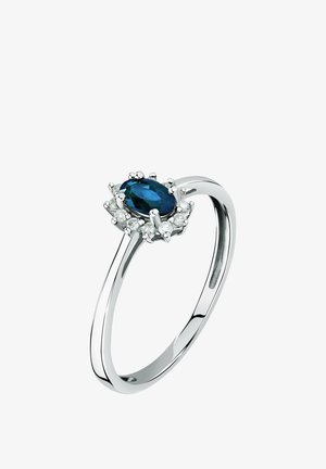Silberner Ring mit ovalem blauen Saphir als Mittelstein, umgeben von kleinen runden weißen Diamanten in einer floralen Halo-Fassung.