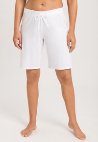Witte katoen shorts met een elastische tailleband en verstelbaar trekkoord. Beschikt over een comfortabele pasvorm en een zachte textuur.