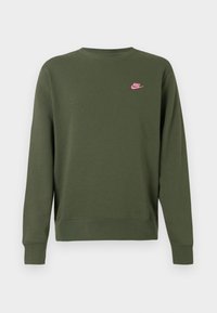Sweatshirt verde feito de uma mistura de algodão, com decote redondo, mangas longas e um logo rosa da Nike no lado esquerdo do peito.