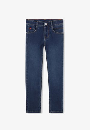 Jean en denim bleu foncé avec une coupe slim, des coutures visibles, deux poches avant et une poche arrière unique. Fermeture par bouton argenté à la taille.