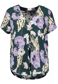 Kukkamekko, jossa on V-pääntie, lyhyet hihat ja rento malli. Vihreä tausta, jossa on suuria purppurakukkia ja lehtityylejä.