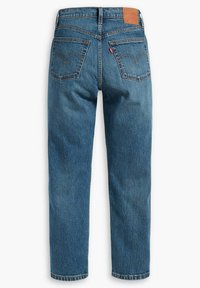 Blue denim jeans with a straight leg design, featuring two back pockets and a brown leather patch at the waistband.