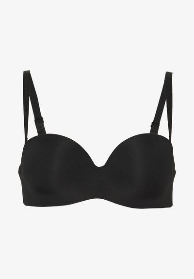 Black underwired bra with smooth, molded cups, adjustable straps, and a U-shaped neckline. Made from a soft, matte fabric.