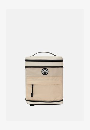 Bolsa térmica aislante beige con detalles negros, asa superior, bolsillo frontal, doble cremallera y parche de logo redondo. Textura suave. Forma rectangular.