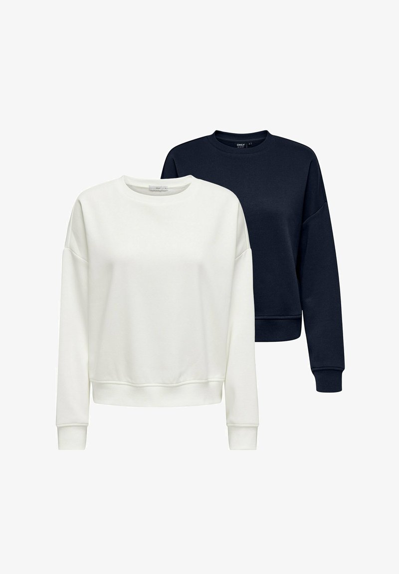 Twee sweaters: een witte en een marineblauwe. Beide hebben een ronde hals, lange mouwen en ribgebreide boorden. Gemaakt van een zachte, gestructureerde stof.