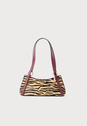 Small handbag with tiger print pattern, maroon leather straps, gold-tone Guess logo, and a charm hanging from the strap ring.