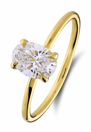 Gold ring with a large oval-cut clear diamond held by four prongs on a white background.