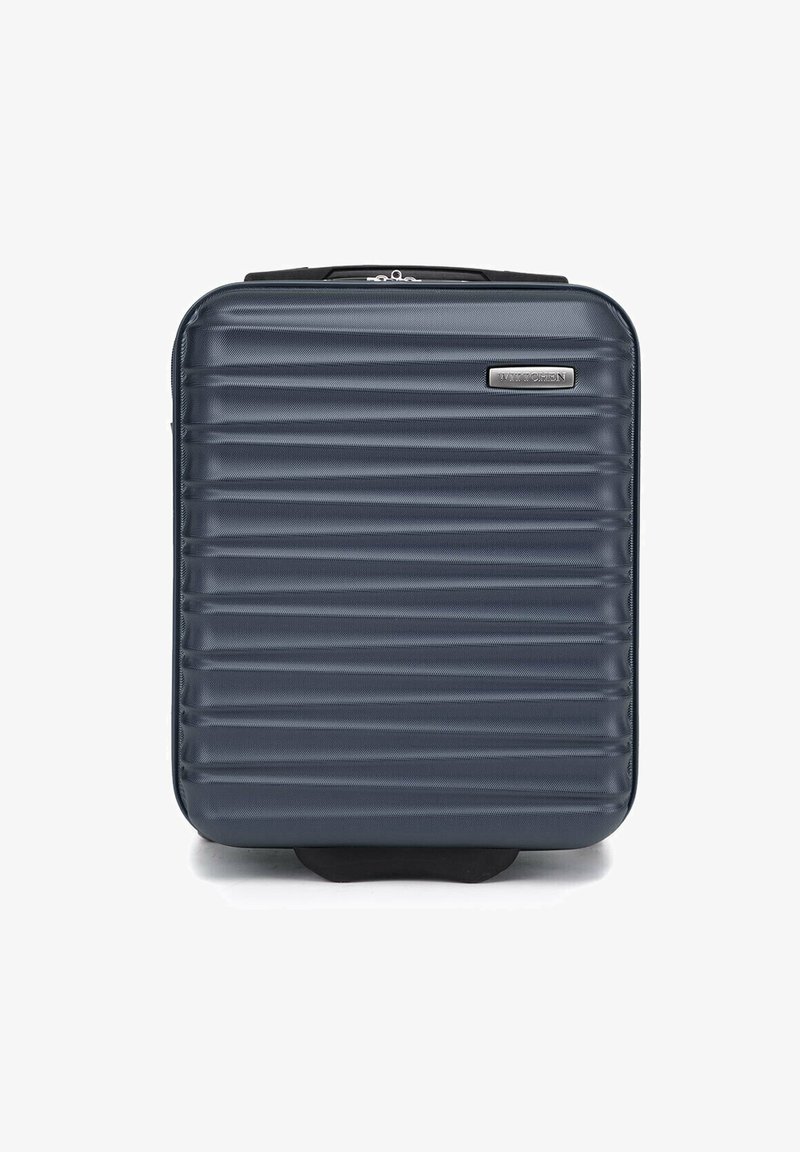 Tvrzený kufr tmavě modré barvy s žebrovanou strukturou, horním uchopovacím madlem a stříbrnou logovou značkou. Zipové uzavření nahoře.