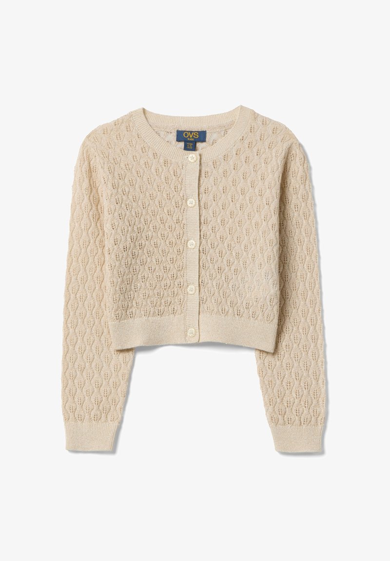 Cardigan per bambini beige lavorato a maglia con maniche lunghe, chiusura frontale con bottoni e un delicato motivo traforato a forma di foglia.