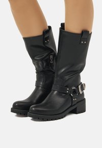 Maria Mare Botines camperos - black
