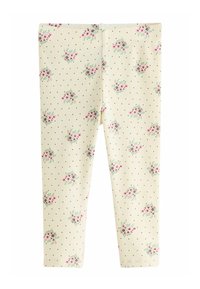 Blumenleggings aus leichtem gelben Rippstoff mit rosa Blumenclustern und kleinen schwarzen Punkten, die eine enganliegende Passform haben.