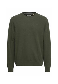 Mørkegrøn crewneck sweatshirt med ribbet tekstur, lange ærmer og et lille logo på brystet. Blødt materiale med en afslappet pasform.