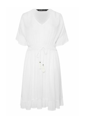 Robe blanche longueur genou avec col en V, manches courtes, taille cintrée avec cordon à nouer et détails de pompons, et un ourlet à volants.