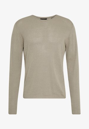 Long-sleeve knit top in light beige, featuring a crew neck, ribbed texture, and subtle sheen throughout the fabric.