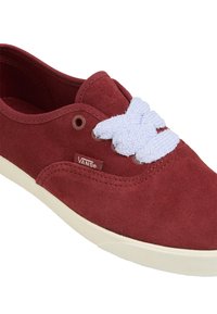 Crimson suede sneaker with a lace-up design, featuring light blue textured laces and a cream rubber sole. VANS logo on the side.