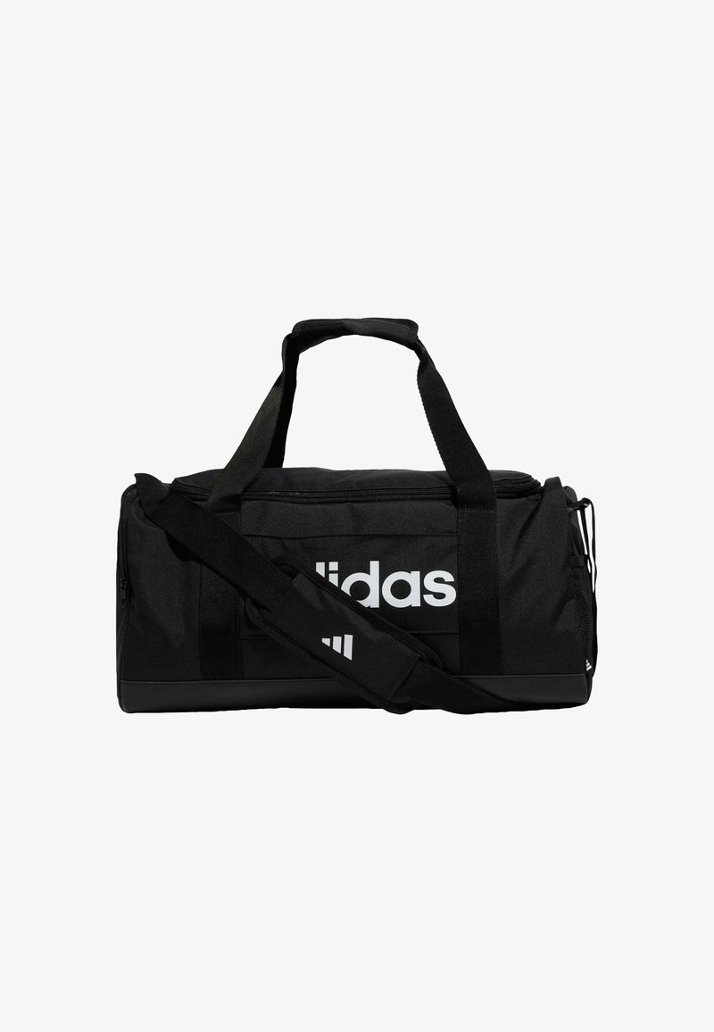 Black duffel bag made of durable fabric, featuring a white "adidas" logo, adjustable shoulder strap, and reinforced handles.