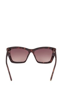 Occhiali da sole tartaruga con montatura quadrata, lenti a gradiente e aste eleganti. Realizzati in plastica con finiture lucide.