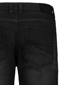 Black denim jeans featuring a smooth texture, two back pockets, and a straight cut. The waistband has a subtle logo detail on the back.