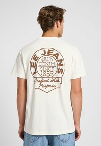 SHORT SLEEVE  - T-shirt med print - ecru