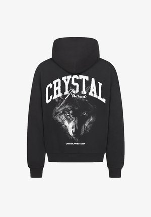 Zwarte hoodie met een grote witte graphic van een wolfengezicht en de tekst "CRYSTAL Paris" op de achterkant. Katoenmix stof, relaxte pasvorm.