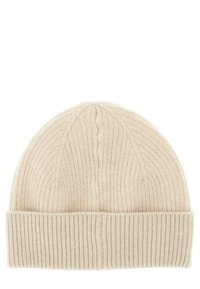 Kootud beanie heledas beežis, millel on sooniktextuur, volditud serv ja juhuslik ülemine disain. Valmistatud pehmest, soojast materjalist.