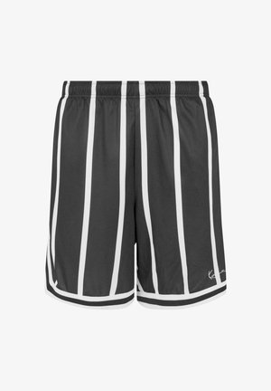 Kraťasy s černobílými pruhy a elastickým pasem, vyrobené z prodyšného materiálu s kontrastním bílým lemem na spodním okraji.