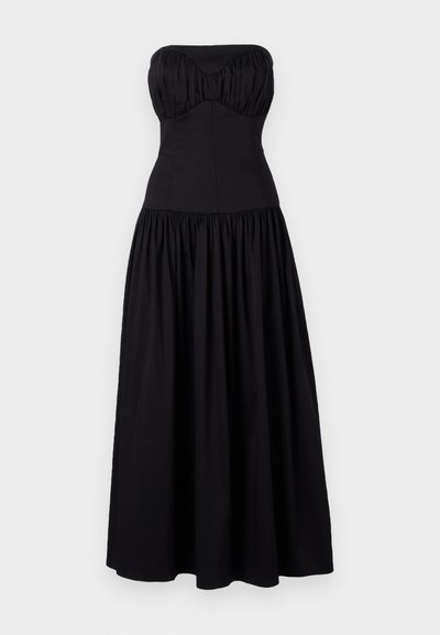 Czarna, bezramienna maxi sukienka z dopasowanym gorsetem i marszczoną spódnicą. Wykonana z gładkiej tkaniny, z dekoltem w kształcie serca i marszczonymi detalami.