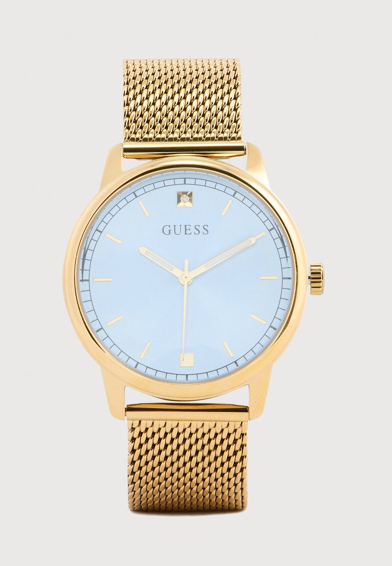 Gouden horloge met een mesh band, lichtblauwe wijzerplaat, gouden uurmarkeringen en een kleine kristal bij de positie van 12 uur.
