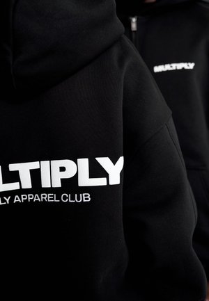 Felpa con zip - black