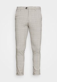 Ljusgrå byxor med rutmönster, försedd med knappstängning och uppvikta muddar. Tillverkade av ett mjukt material med en skräddarsydd passform.