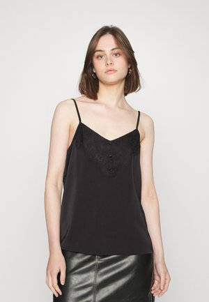 Black camisole featuring a lace trim at the neckline and button details. The fabric has a soft sheen, with thin spaghetti straps.