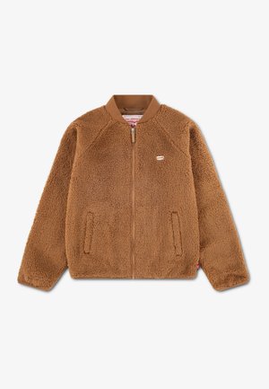 Veste polaire marron zippée avec col côtelé et deux poches avant, ornée d’un petit logo Levi’s sur la poitrine gauche.