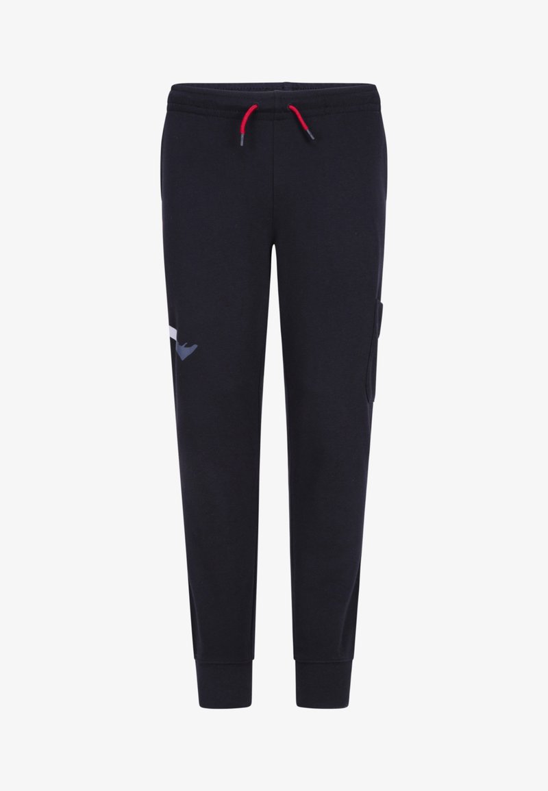 Calças de treino pretas feitas de tecido suave, com cordão na cintura, bolsos laterais e um acento gráfico subtil na perna esquerda.