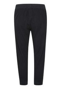 Czarne spodnie z elastycznym pasem i zwężanymi nogawkami. Miękka faktura, krótka długość oraz mankiety przy kostkach. Prosty i schludny styl.